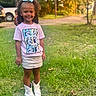 Arabella joined the competition — help win amazing prizes! child, girl, smile, grass, outdoor, curly_hair, bow, tshirt, skirt, boots, sunlight, autumn, trees, background, portrait, happy, nature, daylight, person, standing