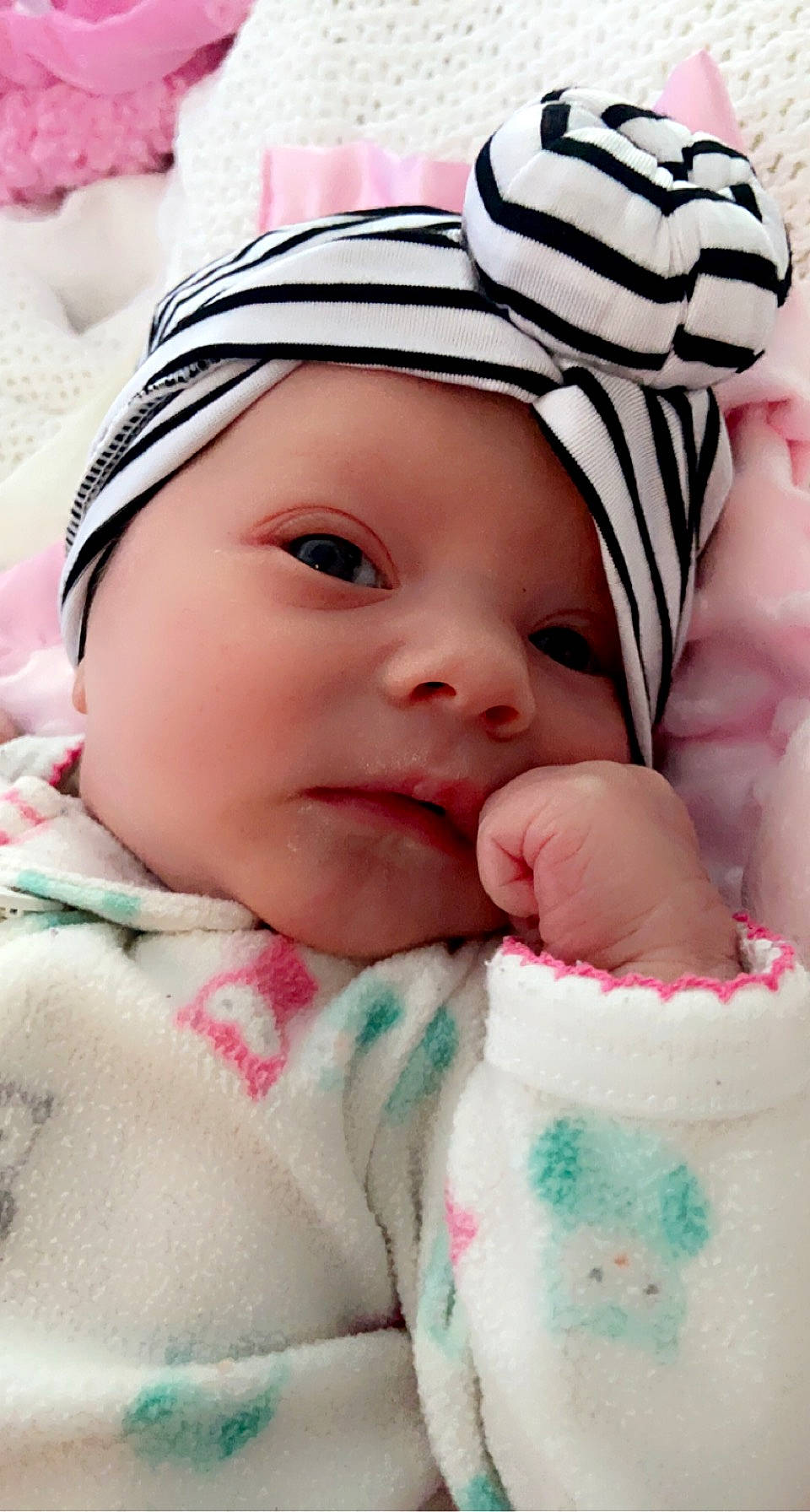 Nevaeh-sky is registered to the contest to win money with this photo: baby, baby_toddler_clothing, cap, cheek, child, chin, close_up, comfort, eye, eyelash, face, finger, grass, happy, headwear, lip, mouth, person, pink, skin