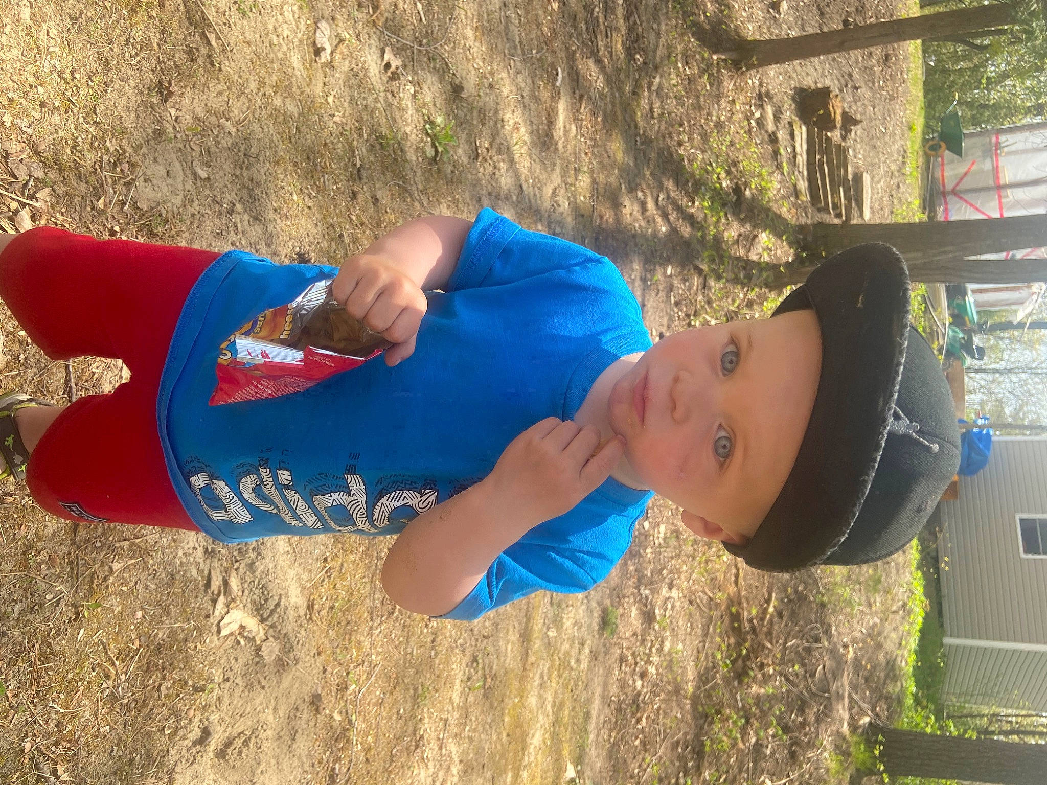 Daxton is registered to the contest to win money with this photo: cap, child, electric_blue, fun, grass, happy, hat, headwear, human_leg, leisure, people_in_nature, person, plant, play, recreation, shadow, smile, soil, t_shirt, tree