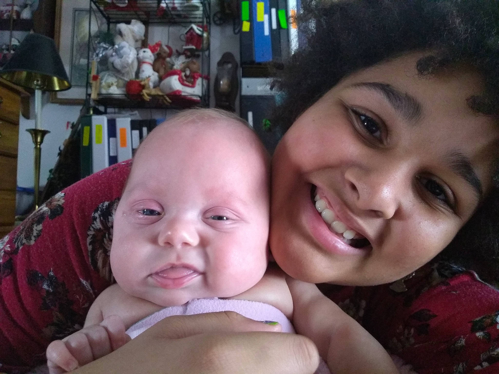 Adrianne is registered to the contest to win money with this photo: black_hair, cheek, child, day, emotion, eye, eyebrow, face, facial_expression, forehead, girl, head, infant, joy, lip, mouth, nose, person, skin, smile