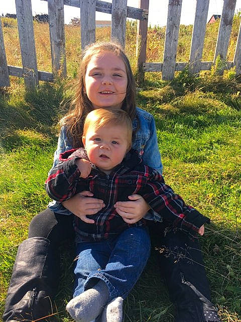 Karson is registered to the contest to win money with this photo: child, grass, joy, lawn, leaf, person, plant, sitting, skin, smile, toddler, tree