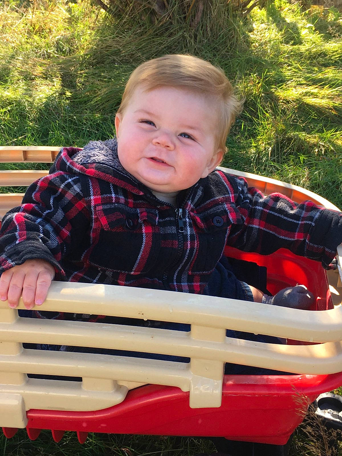 Karson is registered to the contest to win money with this photo: child, person, play, sitting, toddler, vehicle