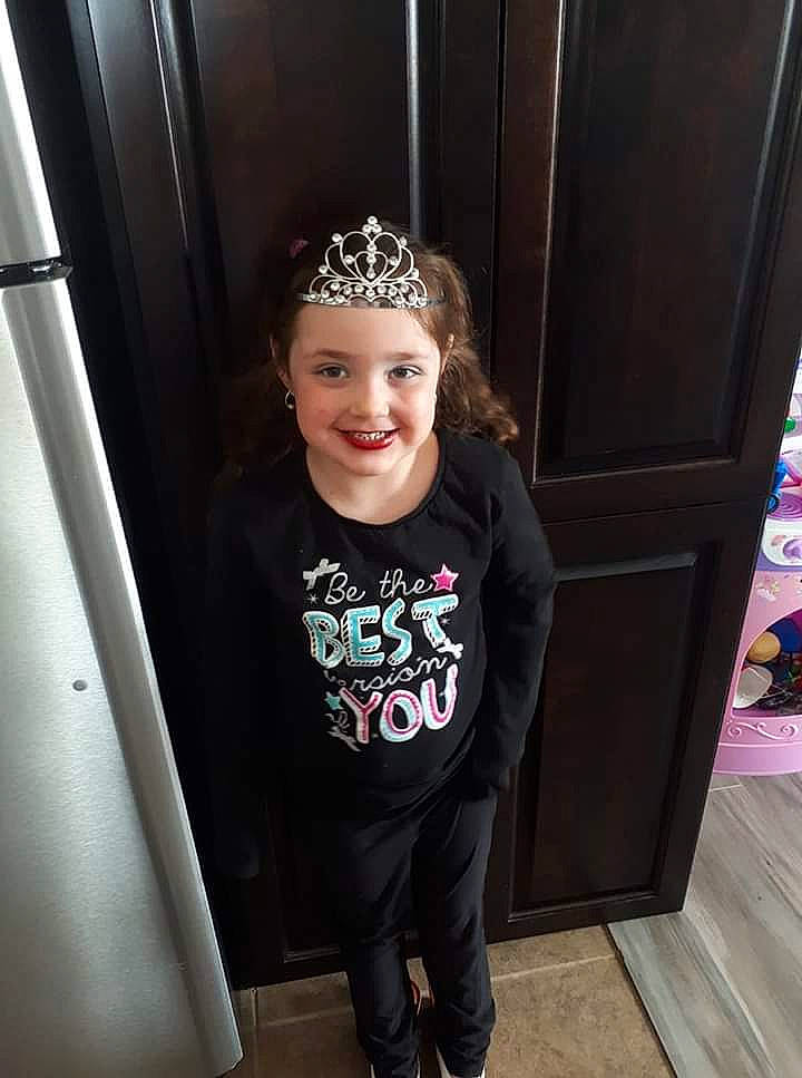 Kiley is registered to the contest to win money with this photo: child, child_model, crown, ear, face, fashion_accessory, footwear, fun, hair_accessory, head, headband, headgear, headpiece, headwear, joy, person, photography, shoe, sleeve, smile