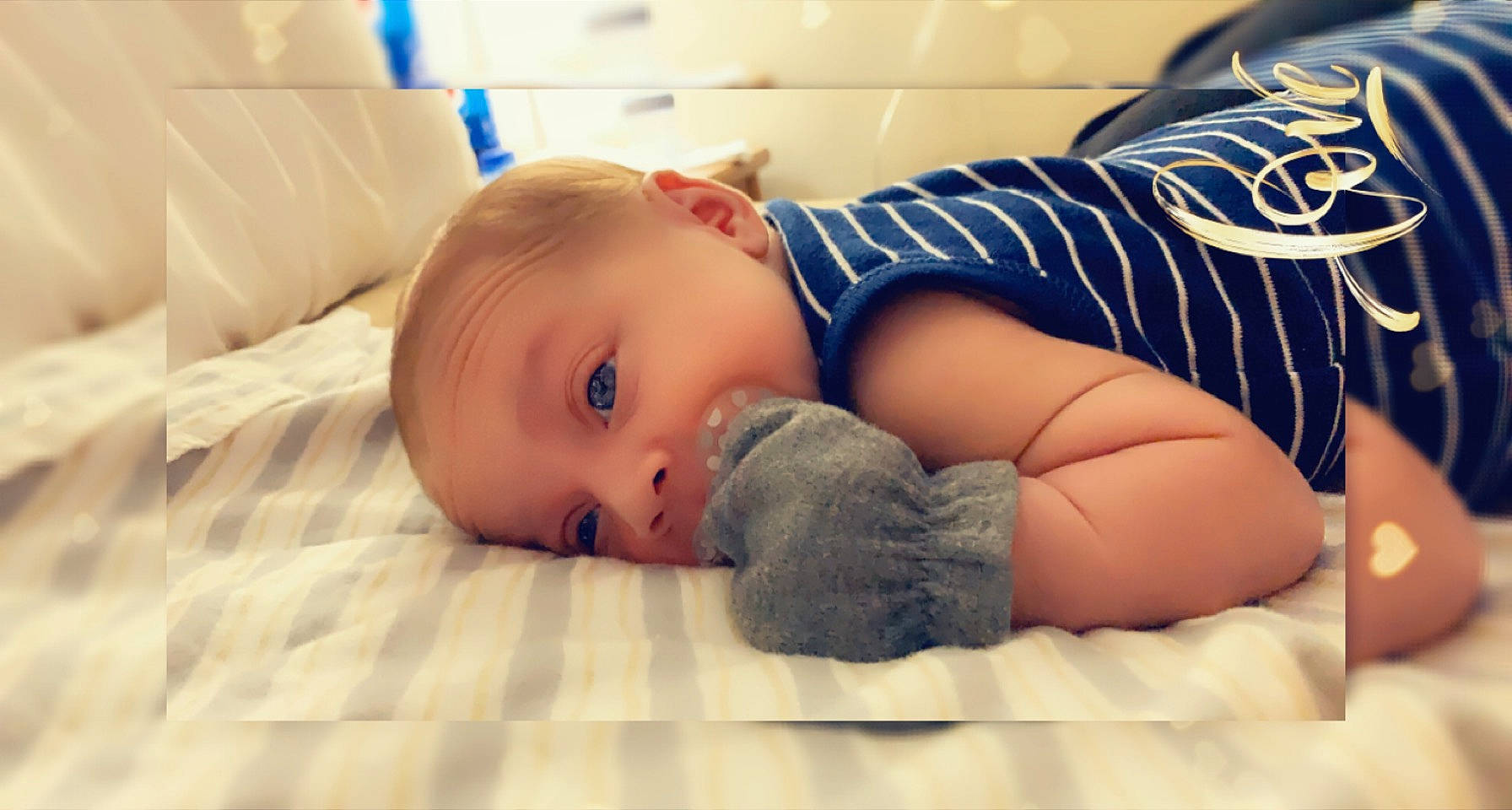 Dakari is registered to the contest to win money with this photo: arm, baby, baby_sleeping, baby_toddler_clothing, bedding, bedtime, child, comfort, elbow, eye, floor, flooring, human_leg, linens, mouth, person, sitting, skin, toddler, tummy_time