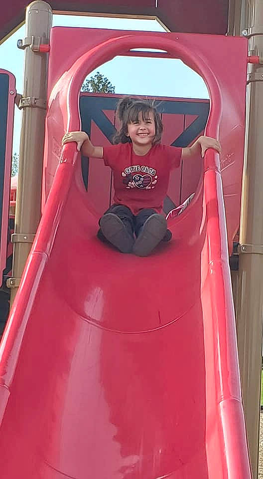 Izzy Nicole joined the competition — help win amazing prizes! automotive_design, automotive_exterior, baby_toddler_clothing, bumper, child, chute, fun, joy, leisure, magenta, motor_vehicle, outdoor_play_equipment, person, pink, playground, recreation, red, shorts, smile, t_shirt