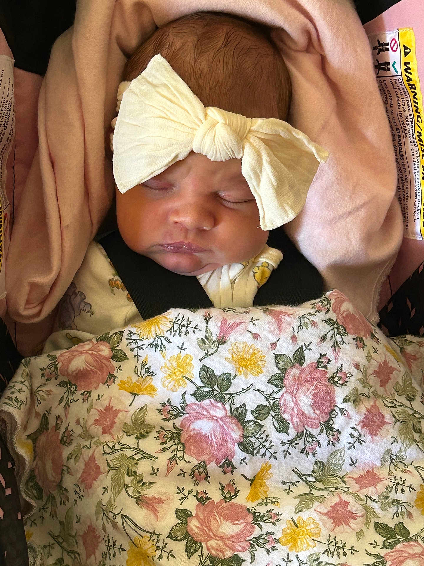 Kinsley joined the competition — help win amazing prizes! baby, sleeping, bow, headband, blanket, floral_pattern, car_seat, pink, infant, child, closeup, face, peaceful, resting, indoors, soft_lighting, cute, clothing, newborn, toddler