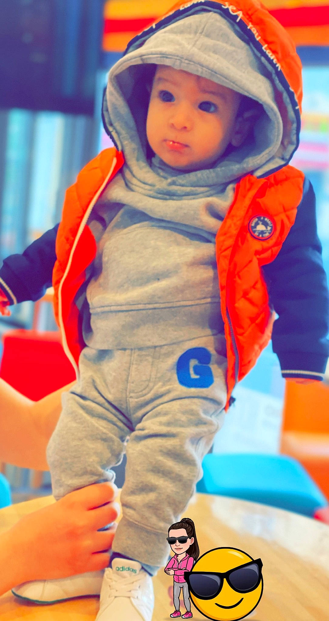 Youssef participe au concours pour gagner de l'argent avec cette photo : astronaut, baby, baby_toddler_clothing, blue, cheek, child, electric_blue, eye, fun, happy, headwear, jacket, leisure, orange, person, personal_protective_equipment, photograph, recreation, sleeve, toddler