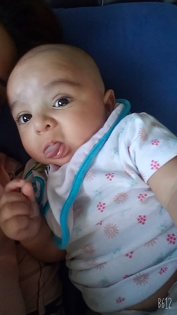 Haadi joined the competition — help win amazing prizes! arm, baby, baby_toddler_clothing, cheek, collar, comfort, eye, eyebrow, finger, gesture, hand, iris, lip, mouth, nose, outerwear, person, skin, sleeve, smile