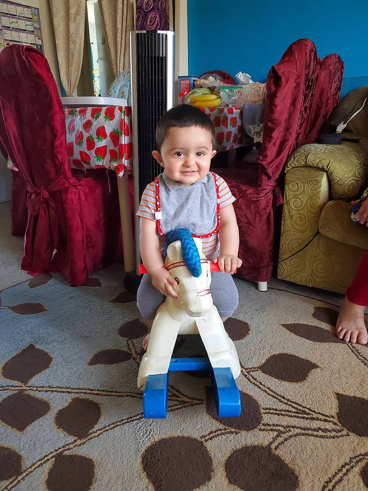 Mustafa joined the competition — help win amazing prizes! baby, baby_toddler_clothing, blue, chair, curtain, eye, floor, flooring, foot, fun, happy, human_leg, joy, leisure, person, room, skin, smile, textile, thigh