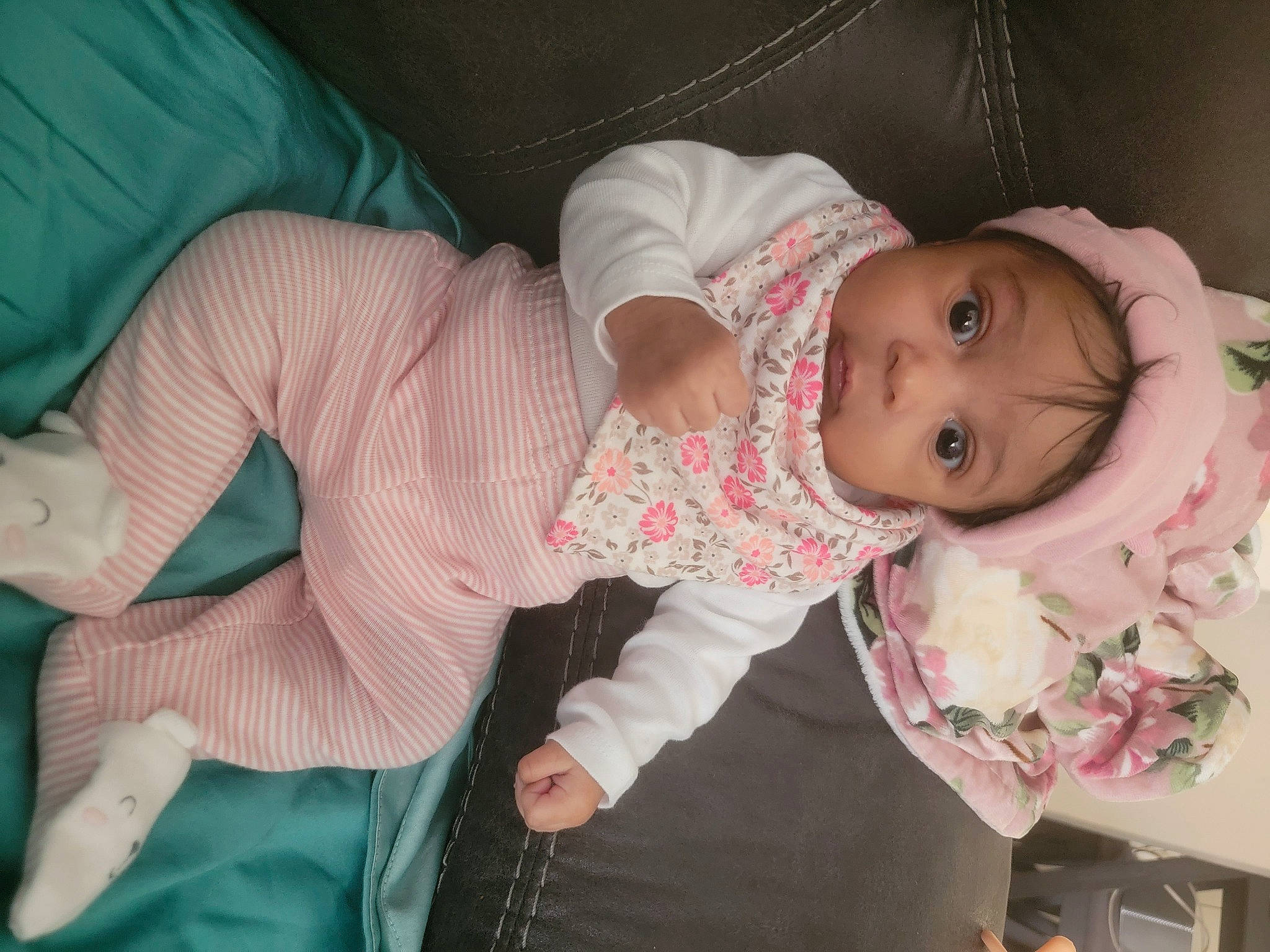 Arianna joined the competition — help win amazing prizes! arm, baby, baby_products, baby_toddler_clothing, cheek, child, comfort, eye, hand, headwear, human_body, iris, lip, mouth, nose, person, pink, skin, sleeve, textile