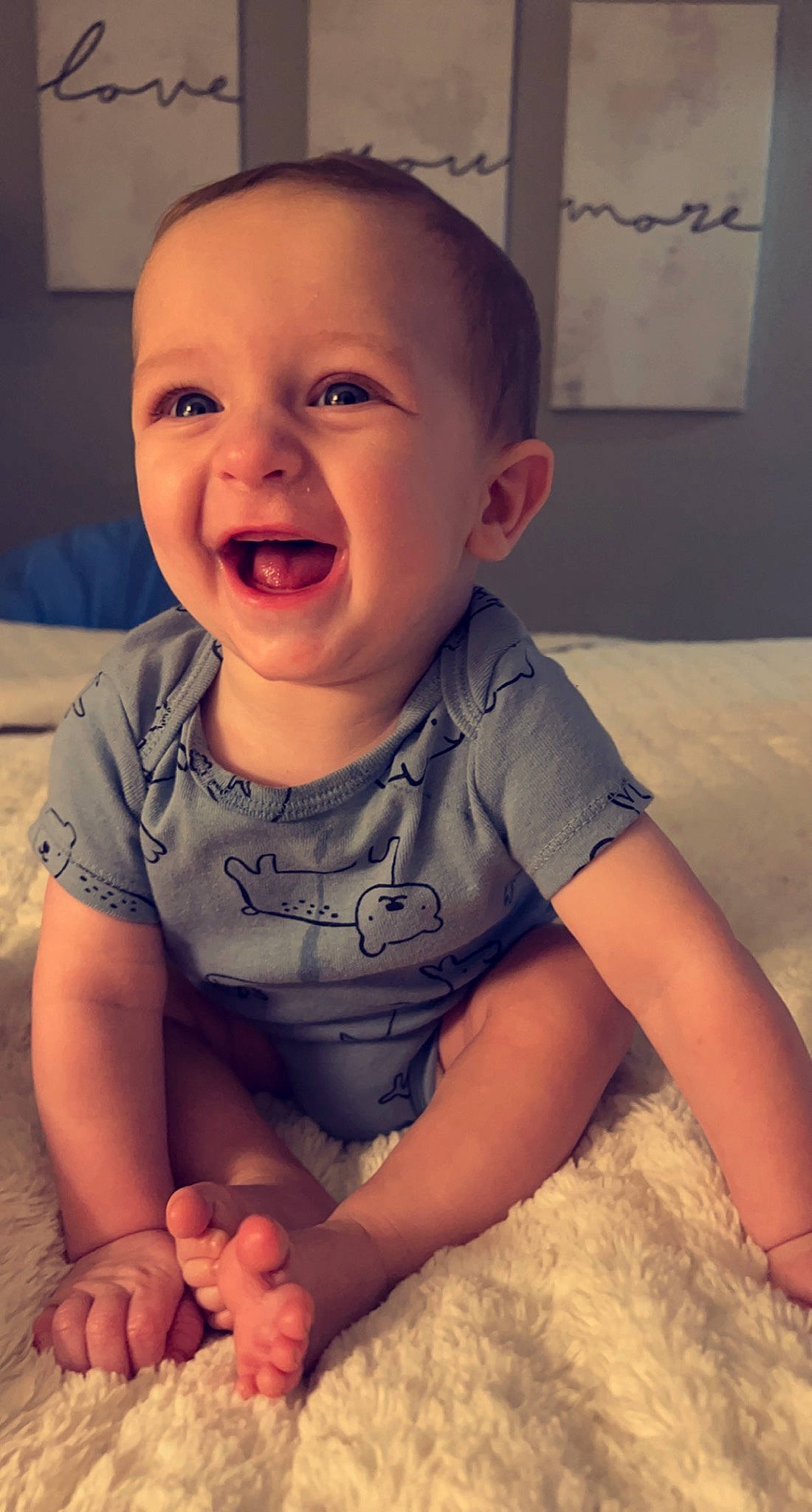 Kohen is registered to the contest to win money with this photo: arm, baby, baby_toddler_clothing, cheek, chin, cool, facial_expression, finger, hand, happy, head, iris, mouth, neck, nose, organ, person, photograph, skin, sleeve