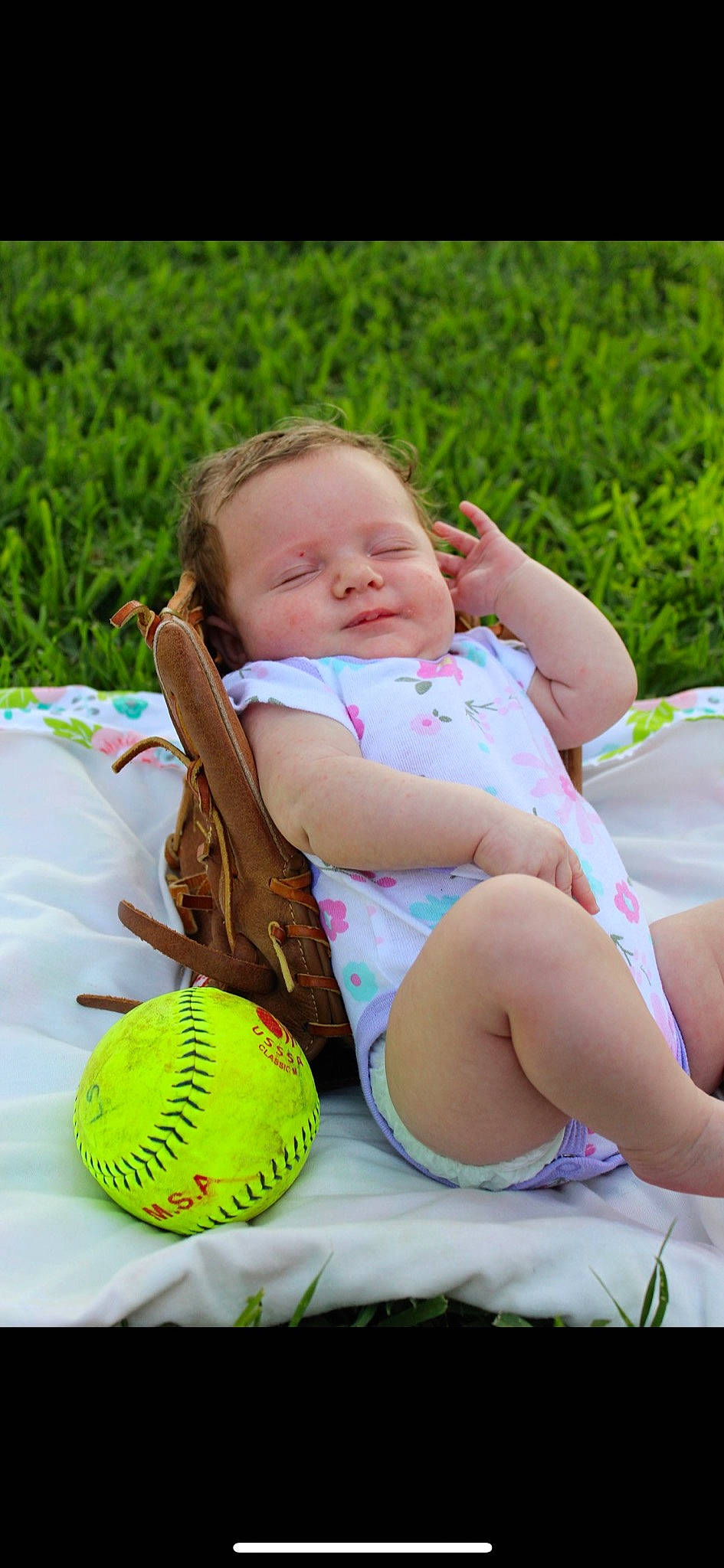 Oakleigh is registered to the contest to win money with this photo: baby, ball, baseball_glove, child, grass, leisure, person, plant, play, smile, toddler