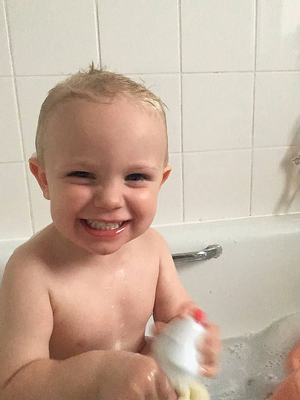 Alfie Bryan Ford is registered to the contest to win money with this photo: baby, baby_bathing, bathing, bathtub, cheek, chest, child, face, facial_expression, head, joy, nose, person, plumbing_fixture, room, skin, smile, toddler, washing