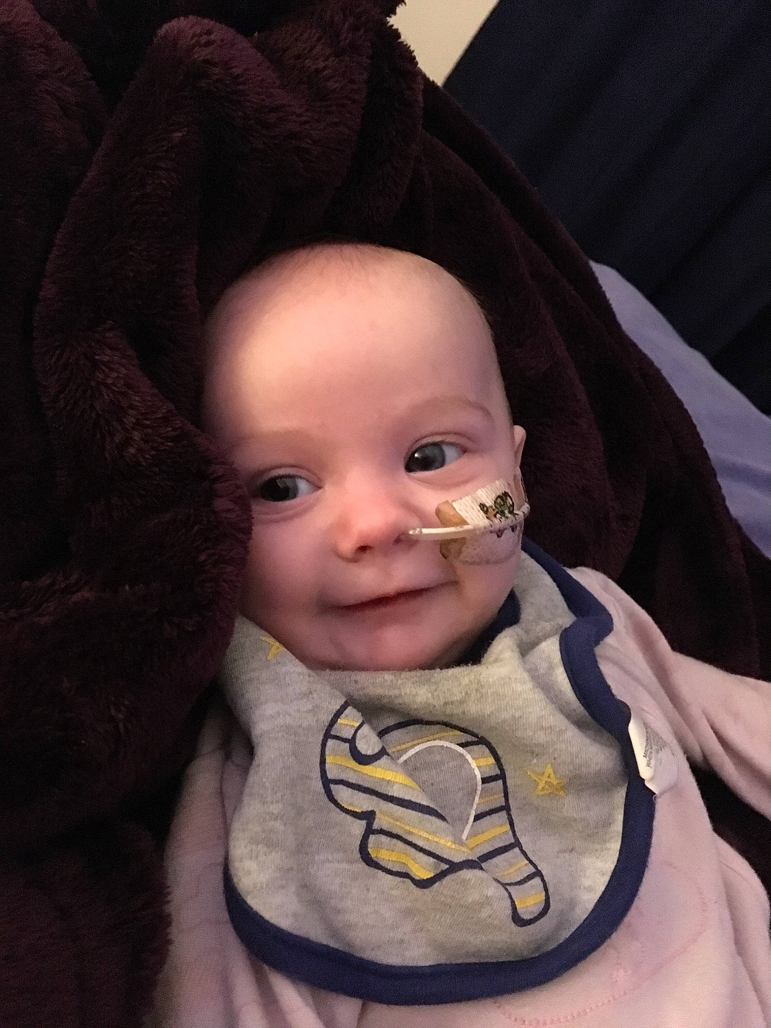 Ellie-mae is registered to the contest to win money with this photo: baby, cheek, child, ear, eye, face, facial_expression, forehead, hand, head, joy, lip, mouth, nose, organ, outerwear, person, skin, smile, toddler