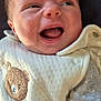 baby, infant, smiling, face, expression, clothing, bear_patch, white_outfit, cute, happy, portrait, child, newborn, closeup, skin, head, person, lying_down, soft_light, indoor