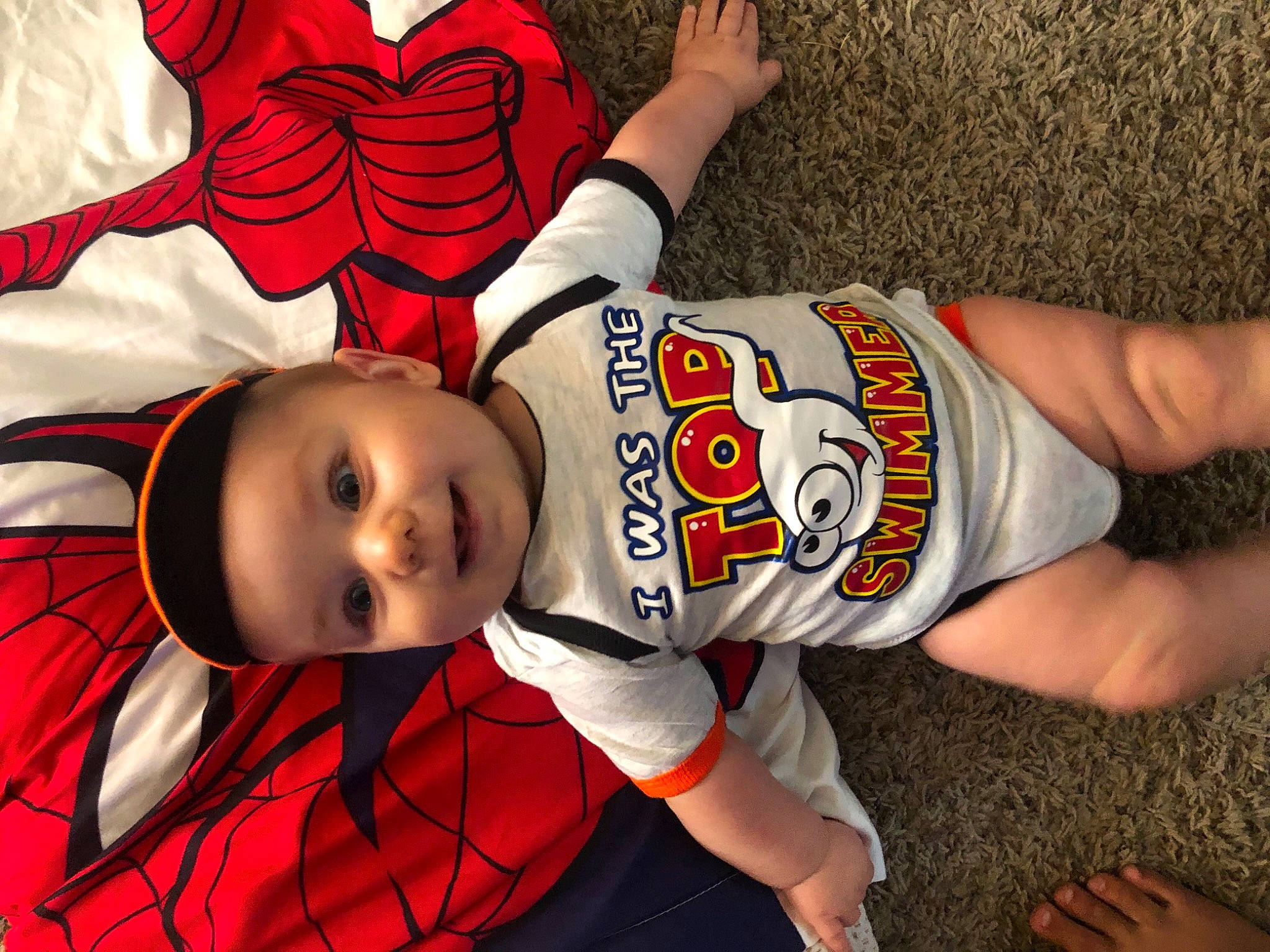 James Wayne joined the competition — help win amazing prizes! elbow, eye, gesture, happy, headgear, headwear, human_body, human_leg, jersey, knee, orange, pattern, person, red, sleeve, sports_uniform, sportswear, t_shirt, thigh, toddler