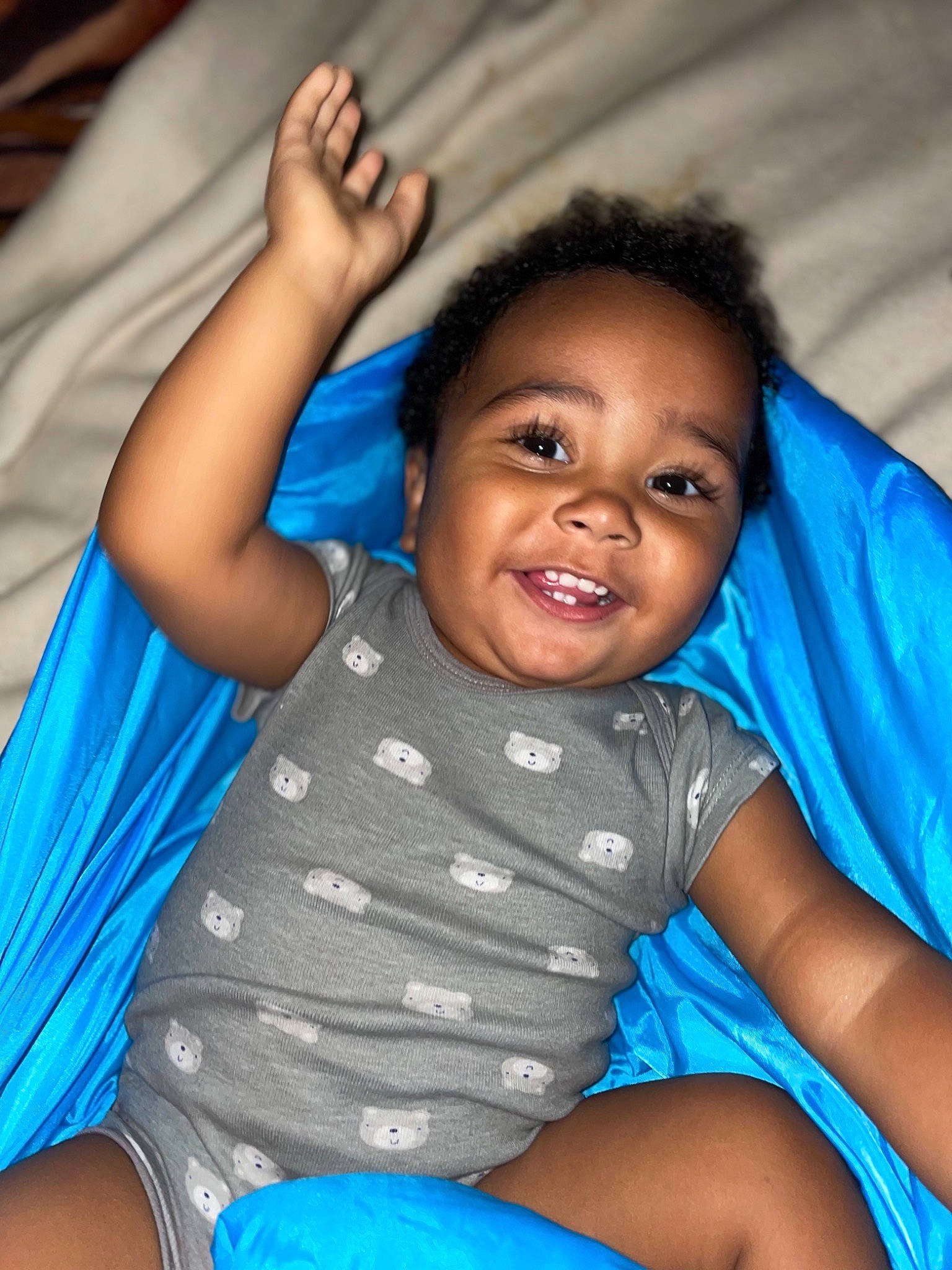 Mateo is registered to the contest to win money with this photo: arm, azure, black, blue, cheek, eye, facial_expression, hairstyle, hand, head, human, joint, joy, mouth, muscle, nose, organ, person, photograph, product