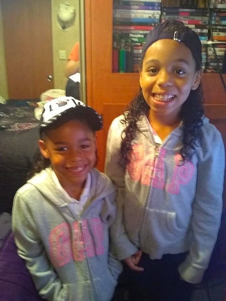 Kylah Lanae joined the competition — help win amazing prizes! child, ear, event, eye, friendship, fun, hairstyle, happy, headgear, iris, joy, leisure, outerwear, person, room, shelf, skin, smile, standing, t_shirt