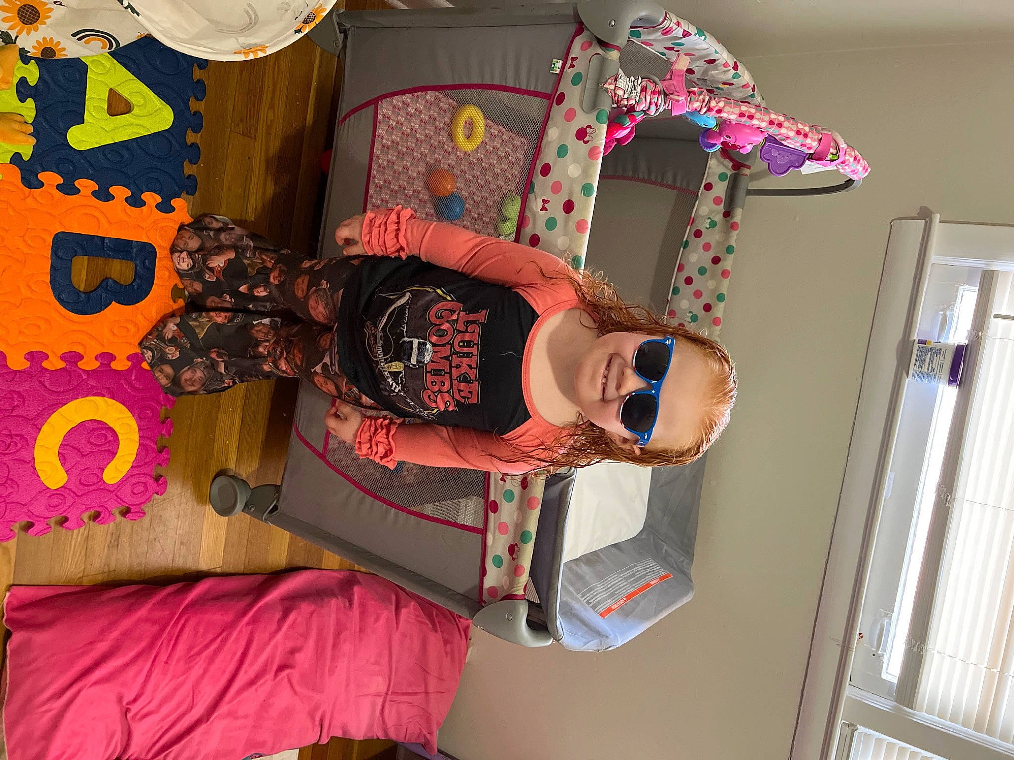 Addilynn is registered to the contest to win money with this photo: art, eyewear, fashion_accessory, fashion_design, fun, joy, linens, magenta, pattern, person, room, smile, textile, thigh, visual_arts