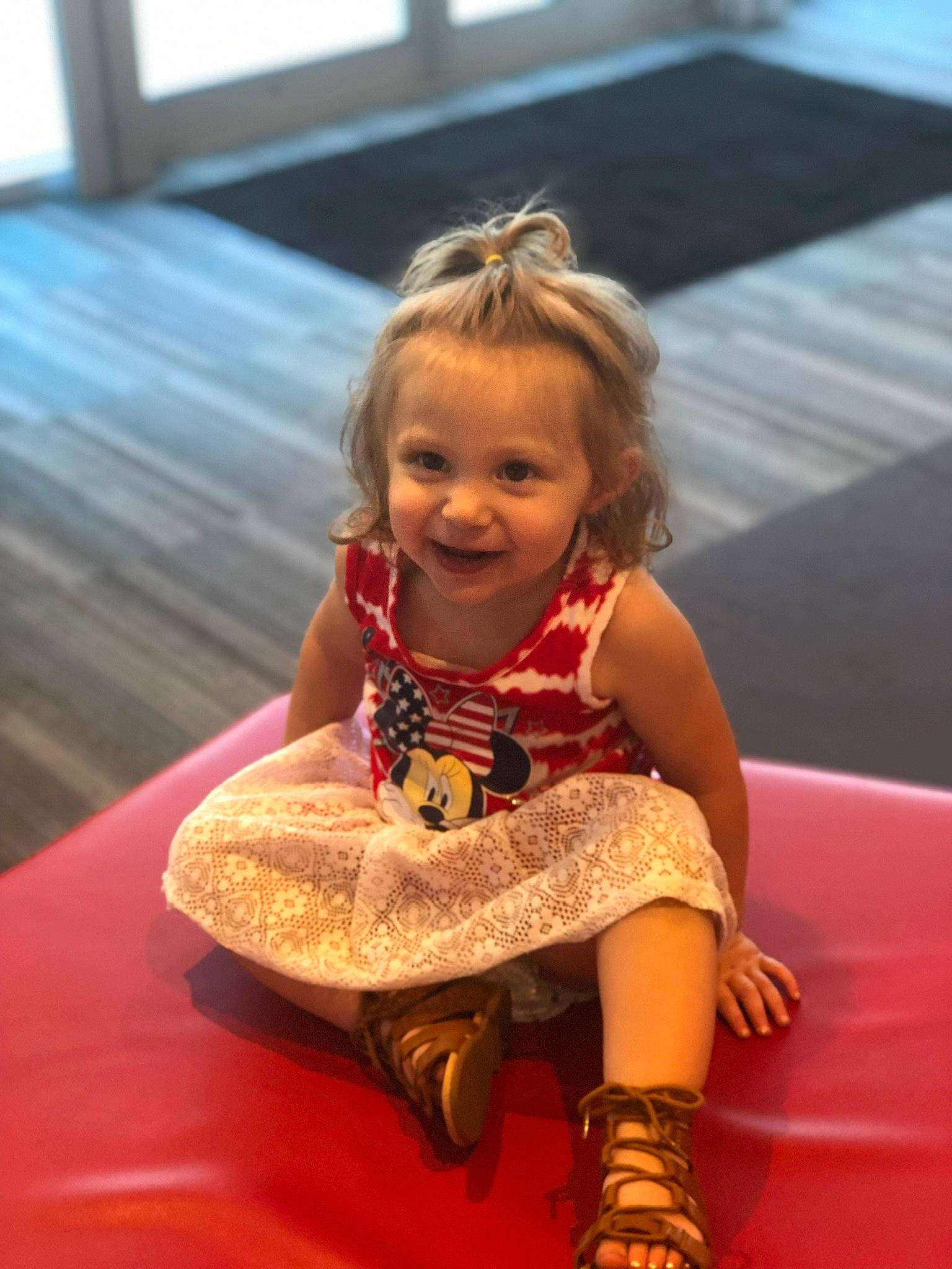 Erika is registered to the contest to win money with this photo: arm, blond, child, child_model, fun, leg, person, play, sitting, smile, toddler, vacation