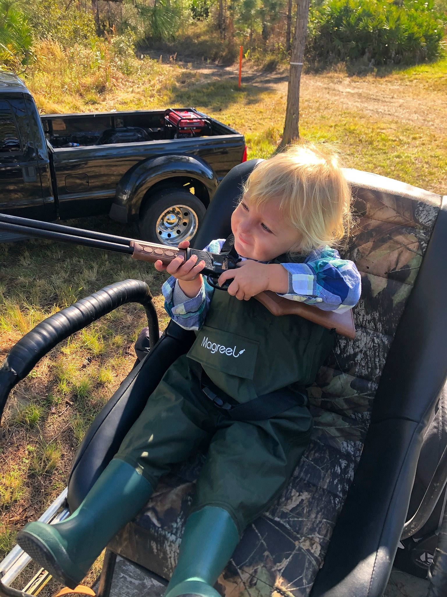 Jax is registered to the contest to win money with this photo: automotive_design, automotive_exterior, automotive_tire, automotive_wheel_system, bumper, car, fender, grass, leaf, leisure, mode_of_transport, motor_vehicle, person, plant, recreation, tire, toddler, vehicle, vehicle_door, wheel