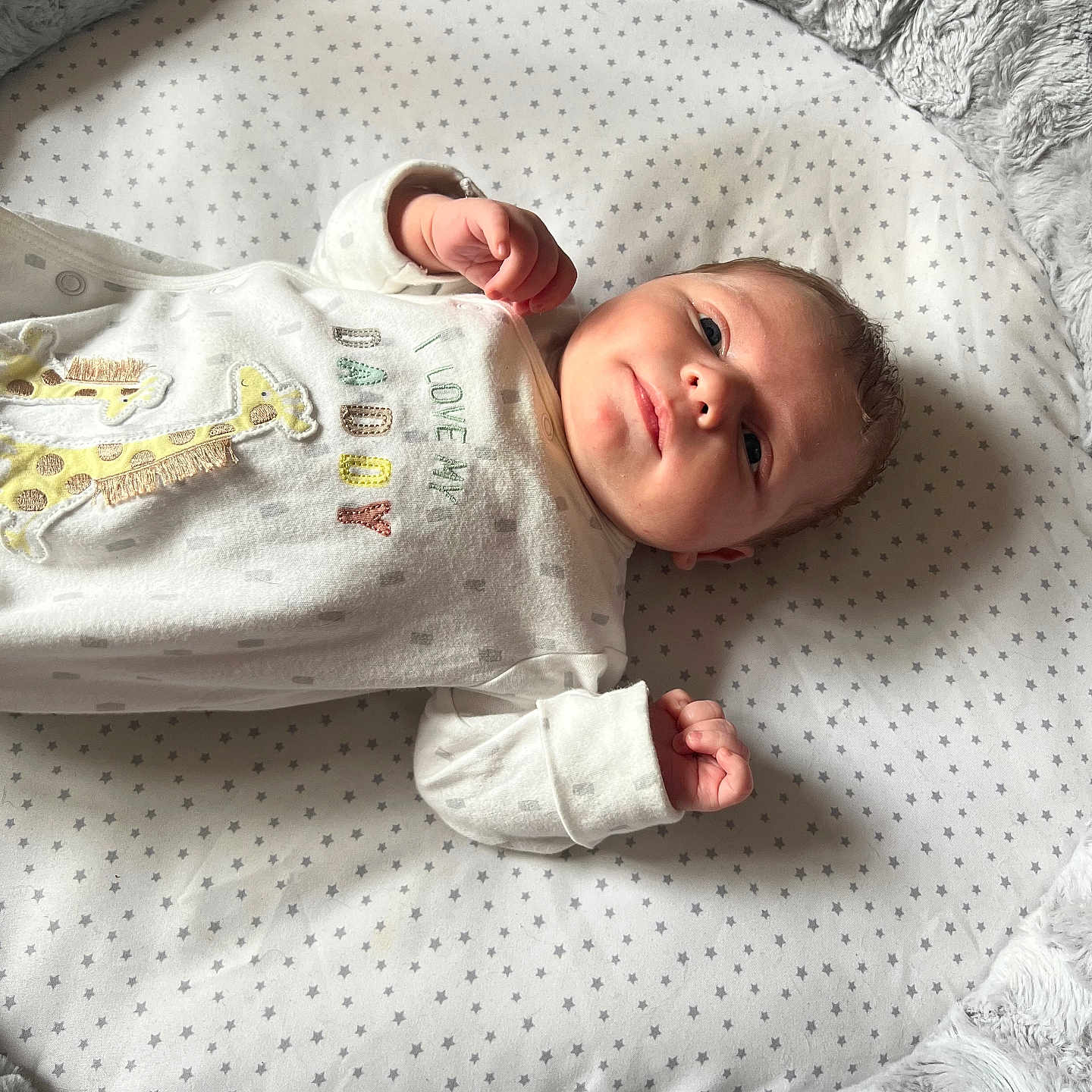 Ollie is registered to the contest to win money with this photo: baby, bed, bedroom, blanket, bodypart, cradle, crib, face, finger, furniture, head, homedecor, indoors, infantbed, linen, newborn, person, photography, portrait, room