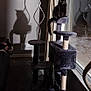Binx is registered to the contest to win money with this photo: art, cat, cat_supply, curtain, darkness, felidae, gas, interior_design, machine, metal, monochrome, monochrome_photography, room, shadow, small_to_medium_sized_cats, tail, visual_arts, window, window_treatment, wood