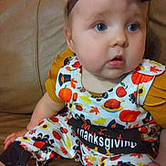 Layla joined the competition — help win amazing prizes! autumn, baby, blue_eyes, bow, child, chubby_cheeks, clothing, colorful, couch, cute, festive, headband, holiday, indoors, leaf, portrait, pumpkin, sitting, thanksgiving, turkey