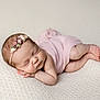newborn, baby, sleeping, infant, pink_wrap, floral_headband, soft_blanket, peaceful, cute, portrait, skin, head, legs, hands, closed_eyes, rest, cozy, tender, child, wrapped