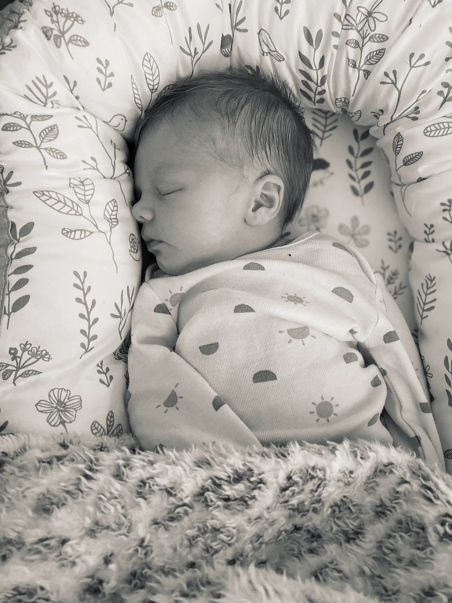 Xavier is registered to the contest to win money with this photo: baby, baby_sleeping, baby_toddler_clothing, bed, bedding, bedtime, child, comfort, font, happy, head, linens, monochrome, monochrome_photography, nap, pattern, person, room, skin, textile