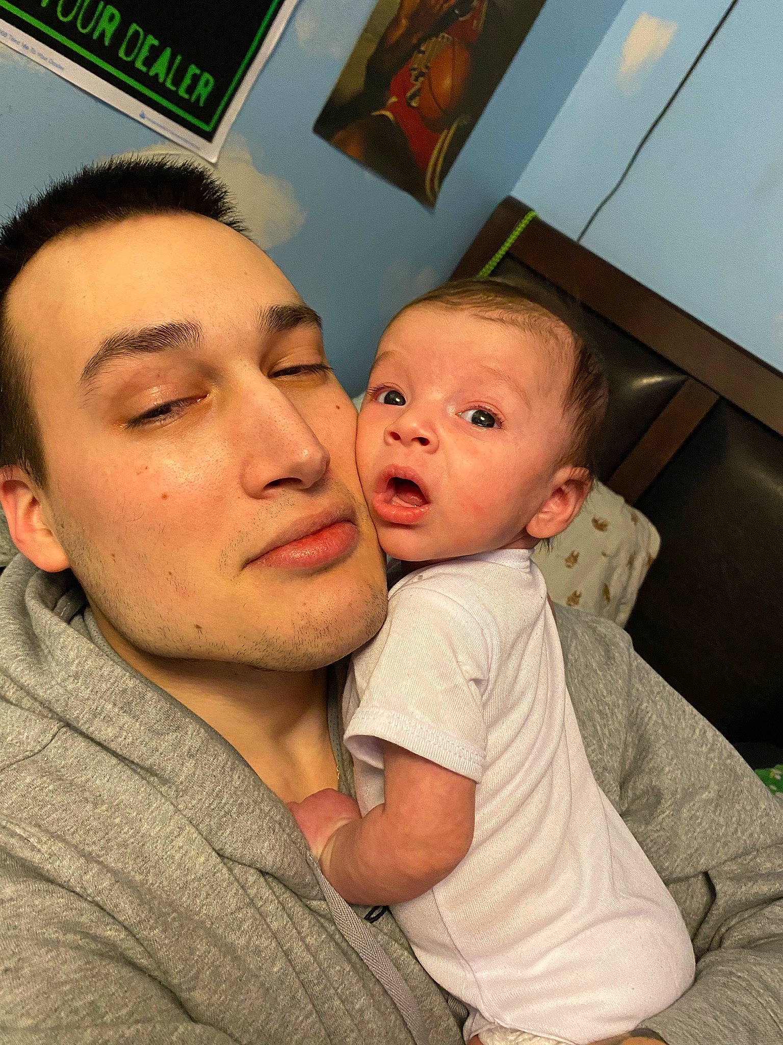 Jack Anthony is registered to the contest to win money with this photo: baby, cheek, child, comfort, couch, eyebrow, eyelash, facial_expression, forehead, fun, gesture, happy, hug, iris, mouth, nose, person, room, skin, surprise
