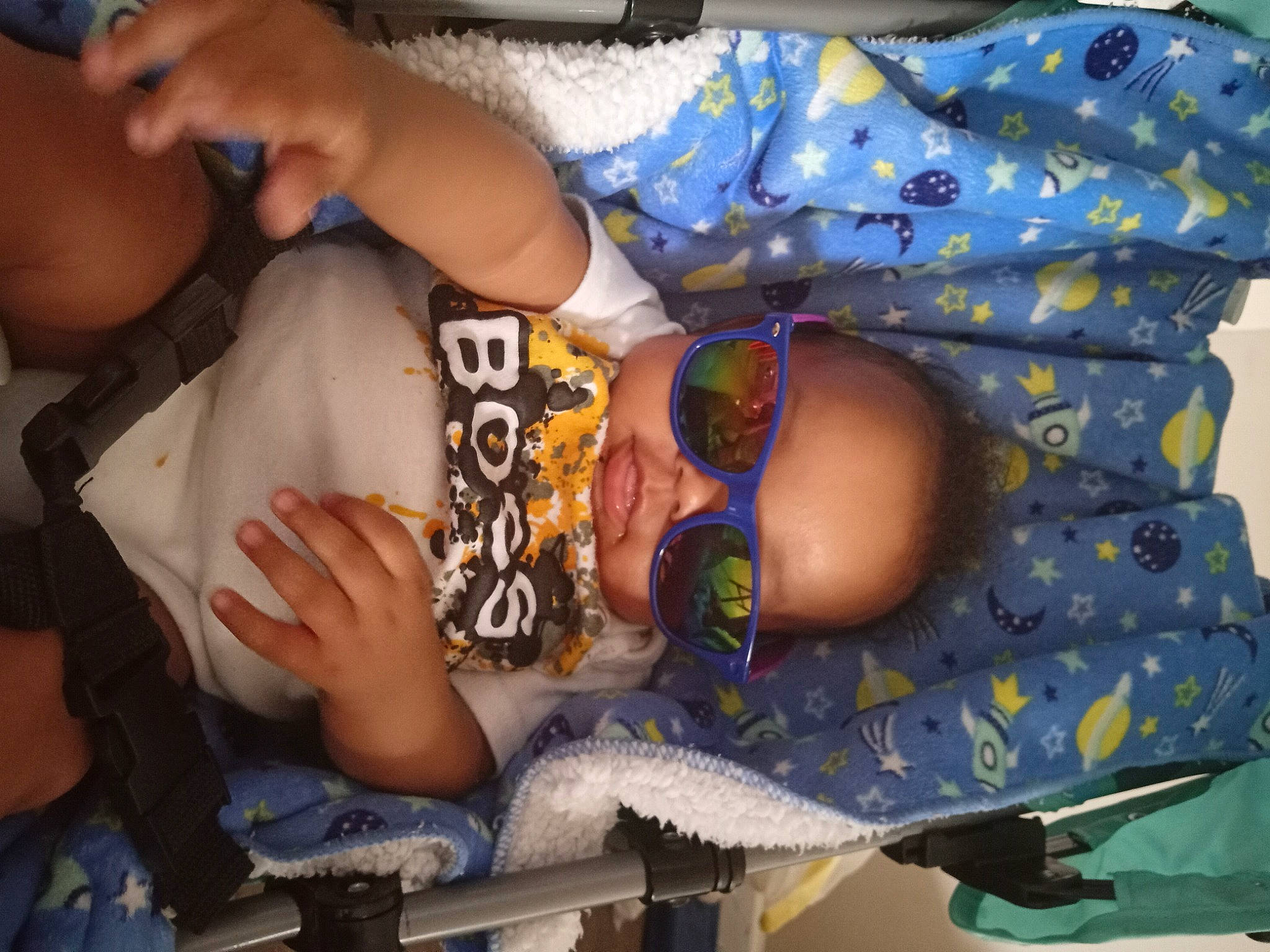 Jeshune is registered to the contest to win money with this photo: abdomen, arm, baby, child, comfort, elbow, finger, fun, hand, human_leg, joint, mouth, nail, pattern, person, sitting, thigh, thumb, toddler, trunk