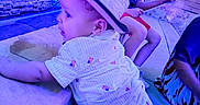 Asher joined the competition — help win amazing prizes! children, baby, toddler, girl, boy, hat, crawling, outdoor, patio, water_feature, stone_wall, blue_lighting, colorful_lighting, portrait, siblings, summer, clothing, shoes, playful, family