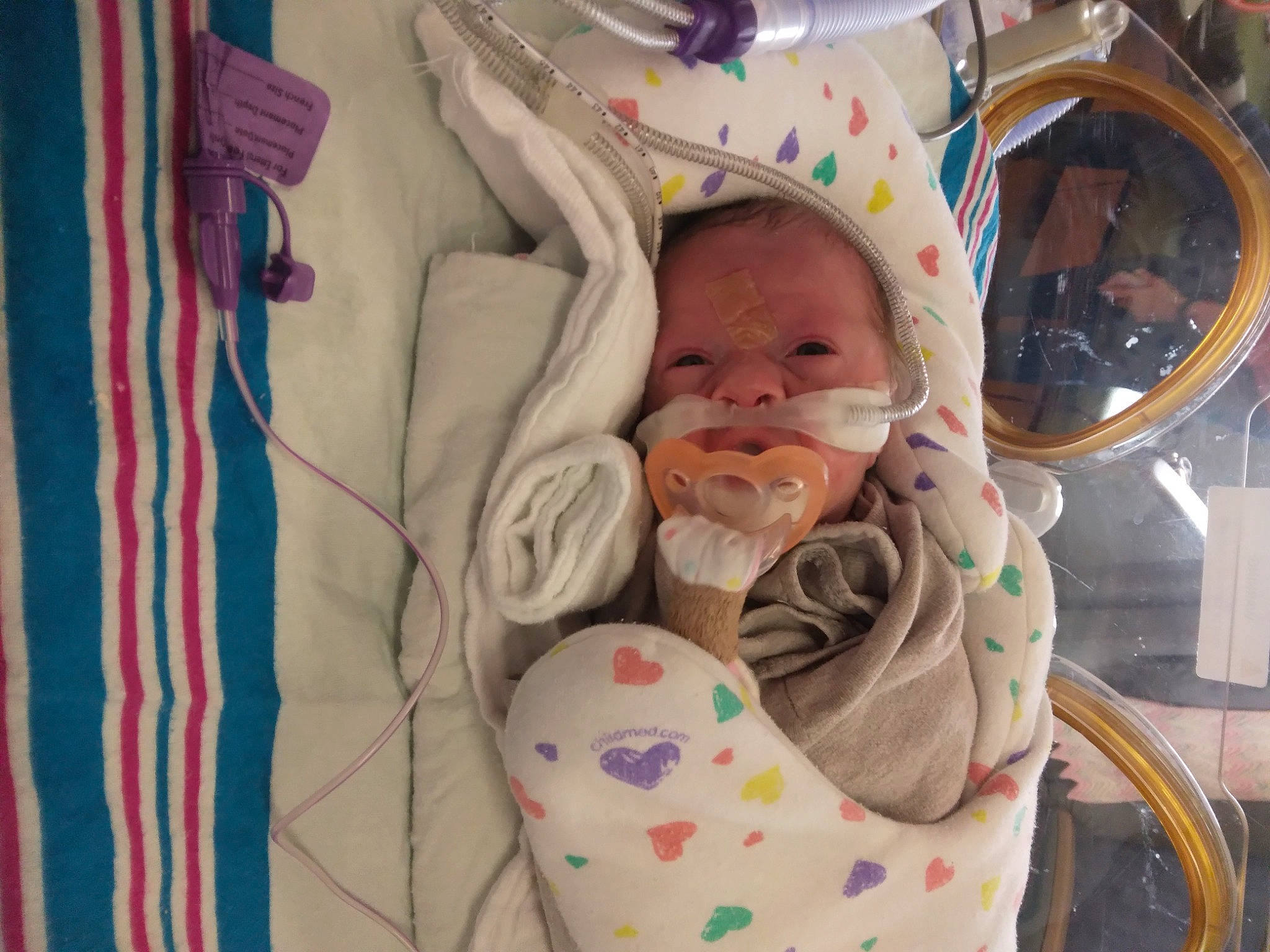 Hailey joined the competition — help win amazing prizes! baby, baby_carriage, baby_products, baby_safety, baby_toddler_clothing, child, comfort, event, health_care, hospital, infant_bed, linens, medical, medical_equipment, pattern, person, room, service, smile, toddler