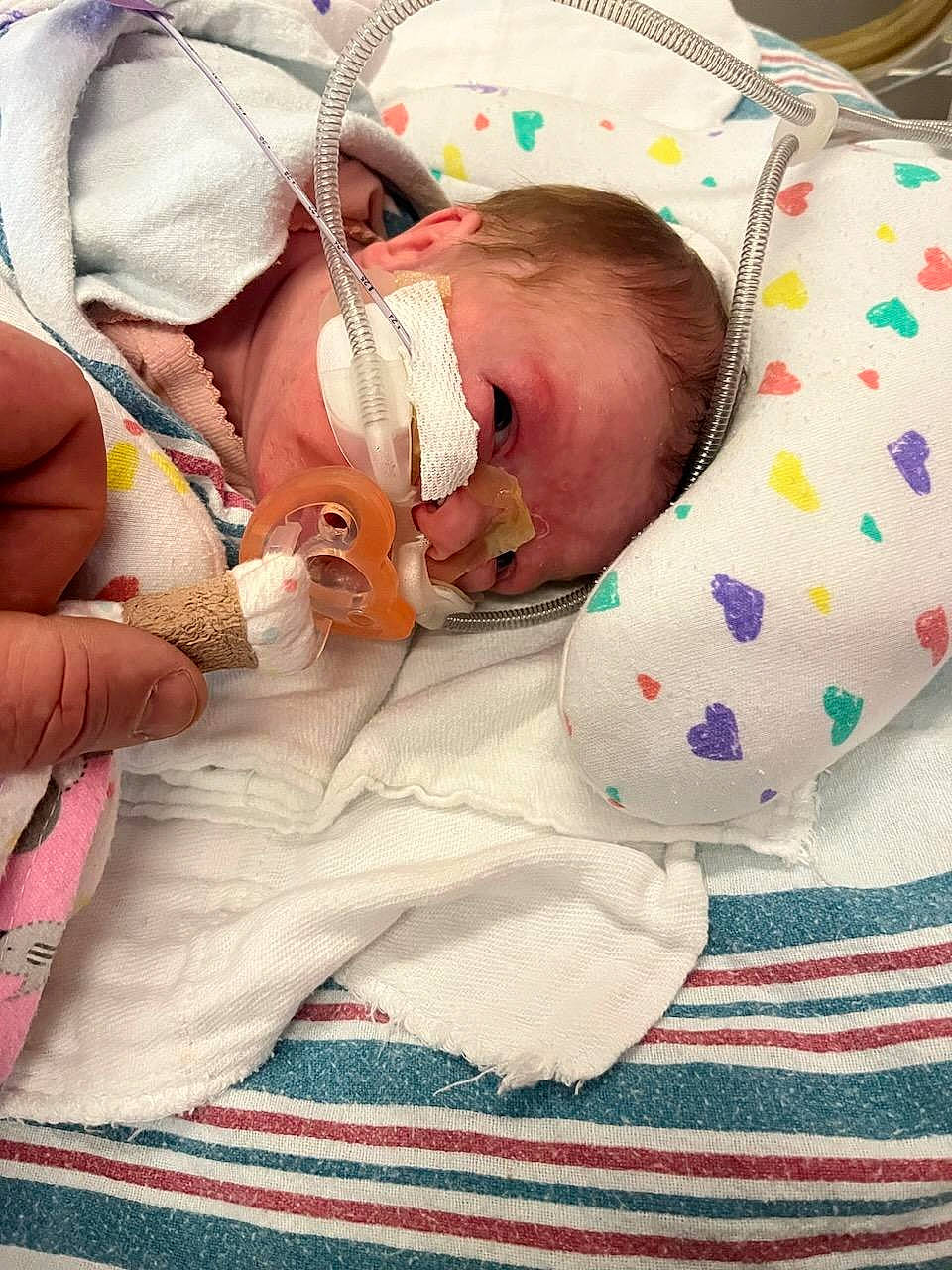 Hailey is registered to the contest to win money with this photo: baby, baby_products, baby_sleeping, baby_toddler_clothing, bedtime, child, comfort, event, linens, nail, pattern, person, room, skin, sleep, textile, thumb, toddler