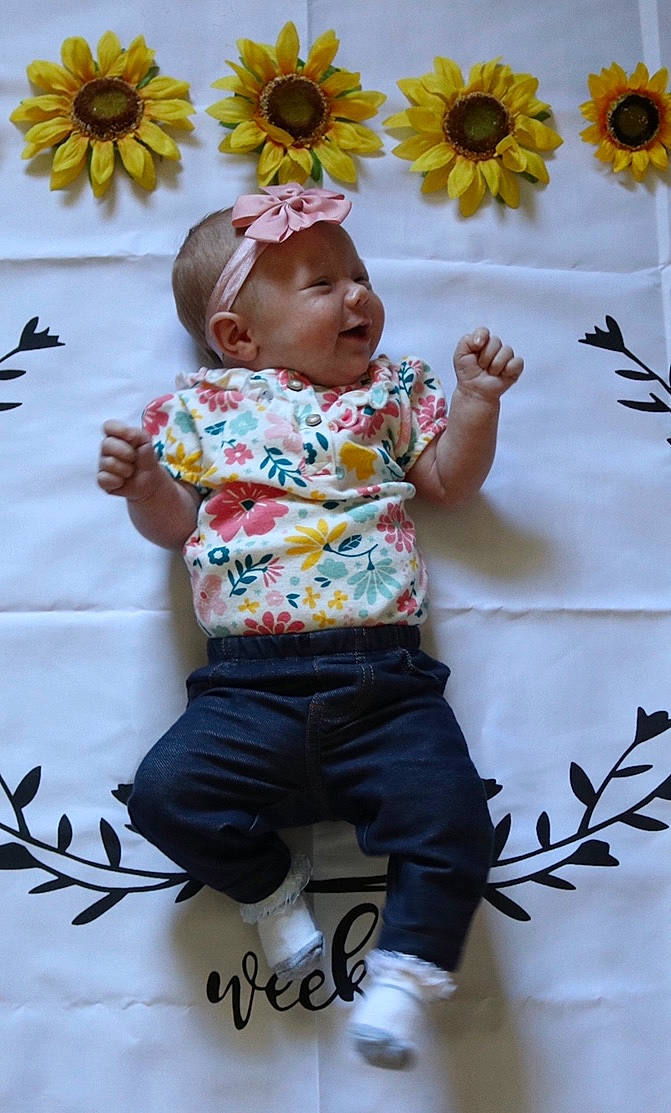 Aiyla joined the competition — help win amazing prizes! baby, child, flower, person, plant, sunflower, toddler