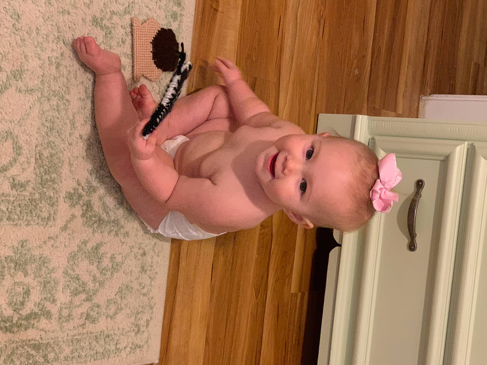 Clara is registered to the contest to win money with this photo: abdomen, baby, baby_toddler_clothing, chest, elbow, eye, eyelash, finger, foot, happy, head, human_body, human_leg, joy, neck, person, stomach, thigh, thumb, toddler