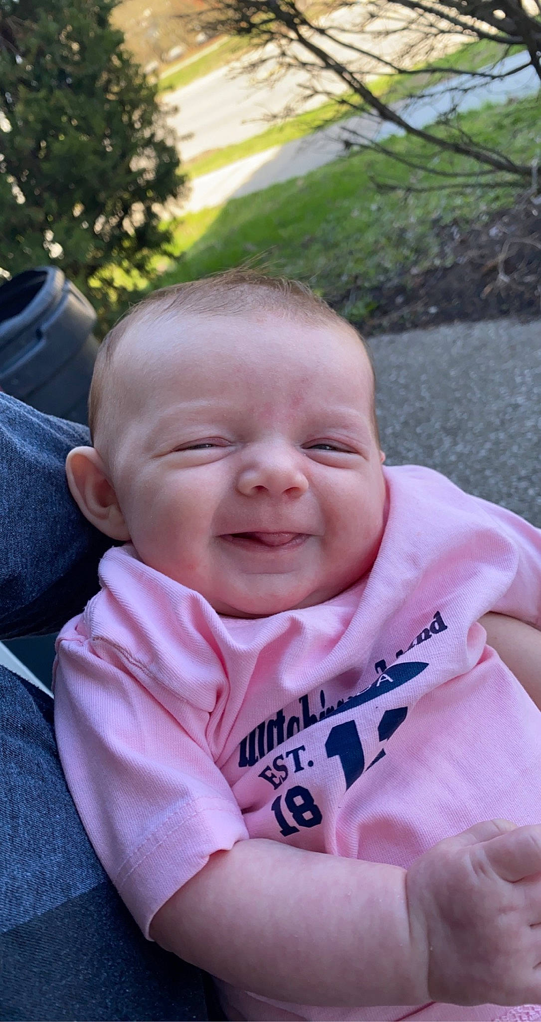Baylee joined the competition — help win amazing prizes! baby, baby_products, baby_toddler_clothing, cheek, child, fun, grass, happy, laugh, leisure, lip, person, pink, plant, portrait_photography, sitting, skin, sleeve, smile, toddler