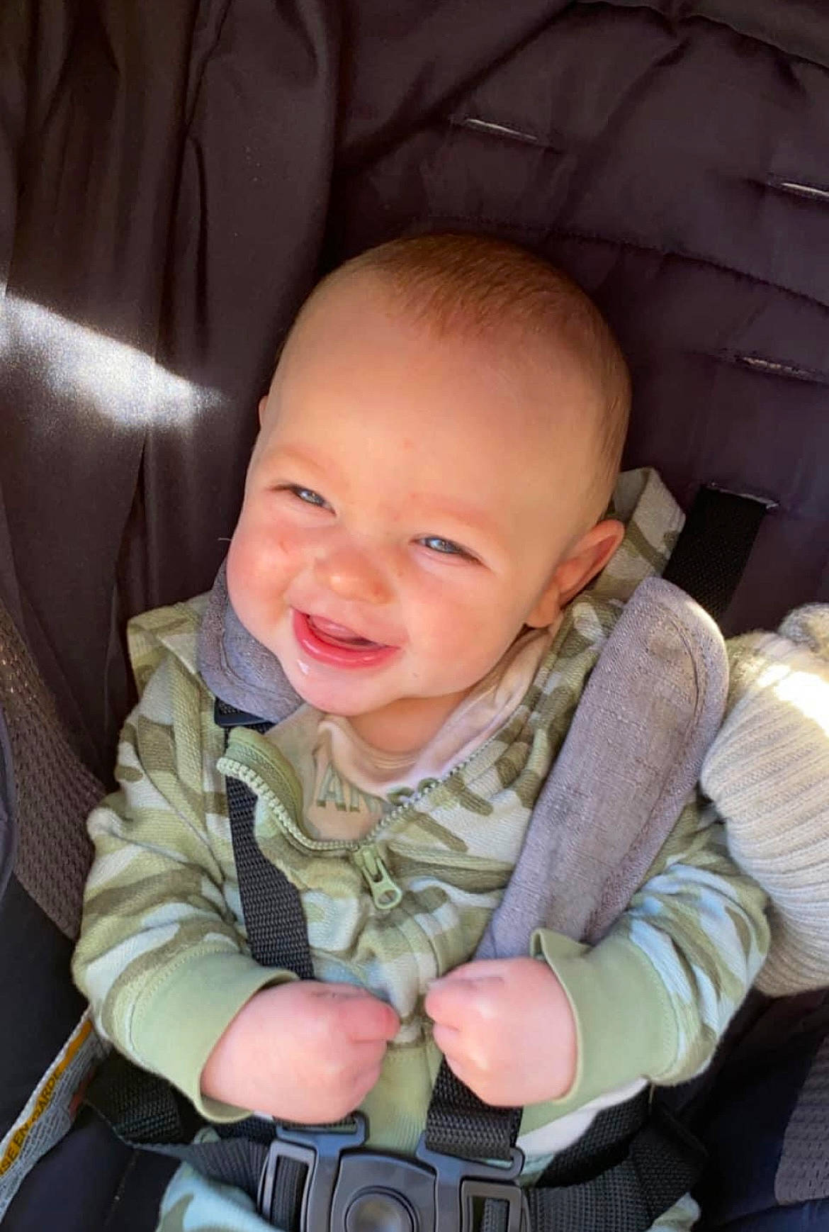 Kohen is registered to the contest to win money with this photo: baby, baby_carriage, baby_toddler_clothing, cheek, comfort, ear, eye, eyebrow, facial_expression, finger, hairstyle, head, iris, mammal, mouth, nose, organ, person, skin, sleeve