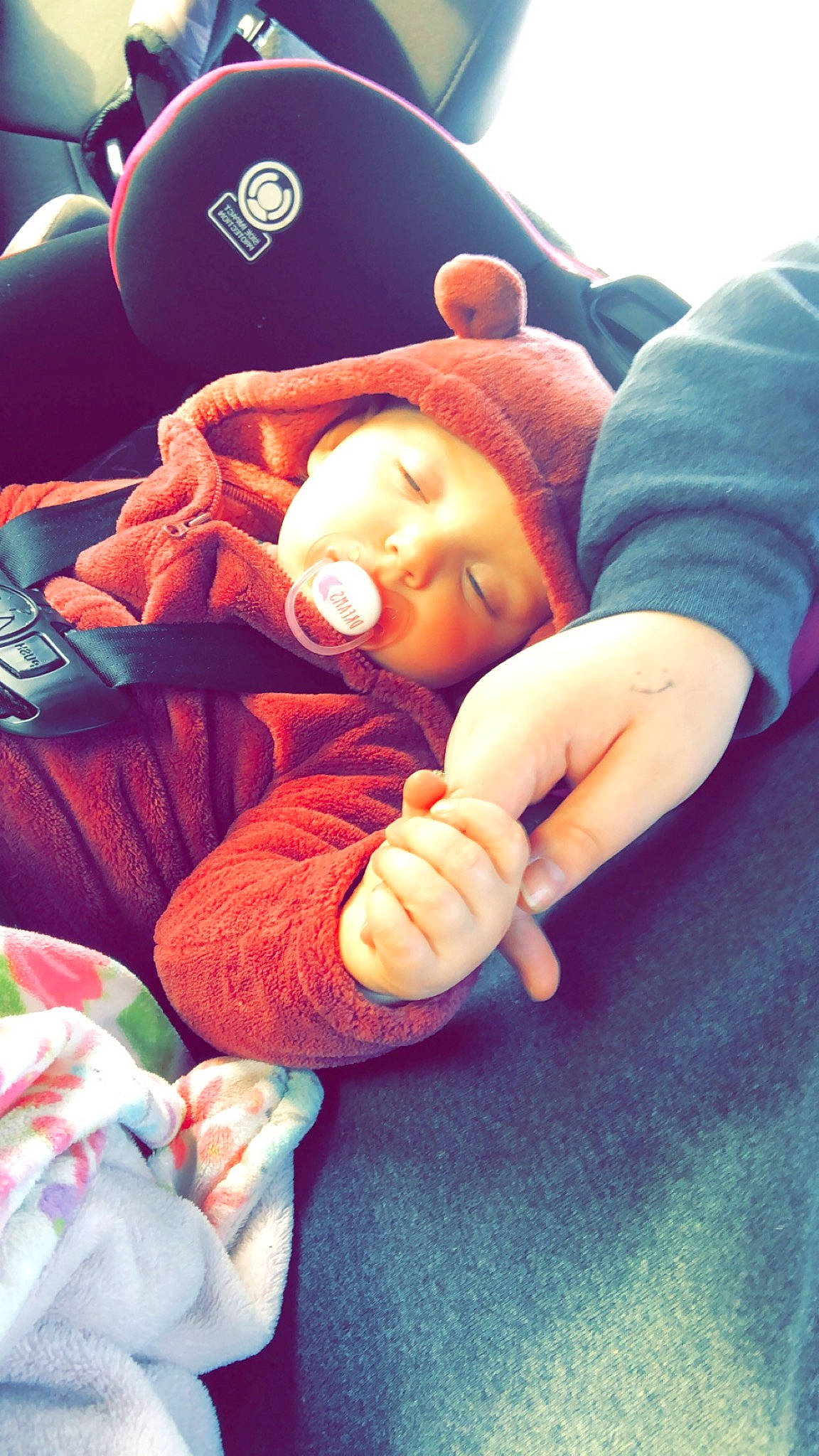 Kinsleigh is registered to the contest to win money with this photo: baby, baby_products, baby_sleeping, child, comfort, finger, foot, fun, gesture, hand, happy, headwear, lap, linens, mouth, nail, person, sitting, skin, thumb