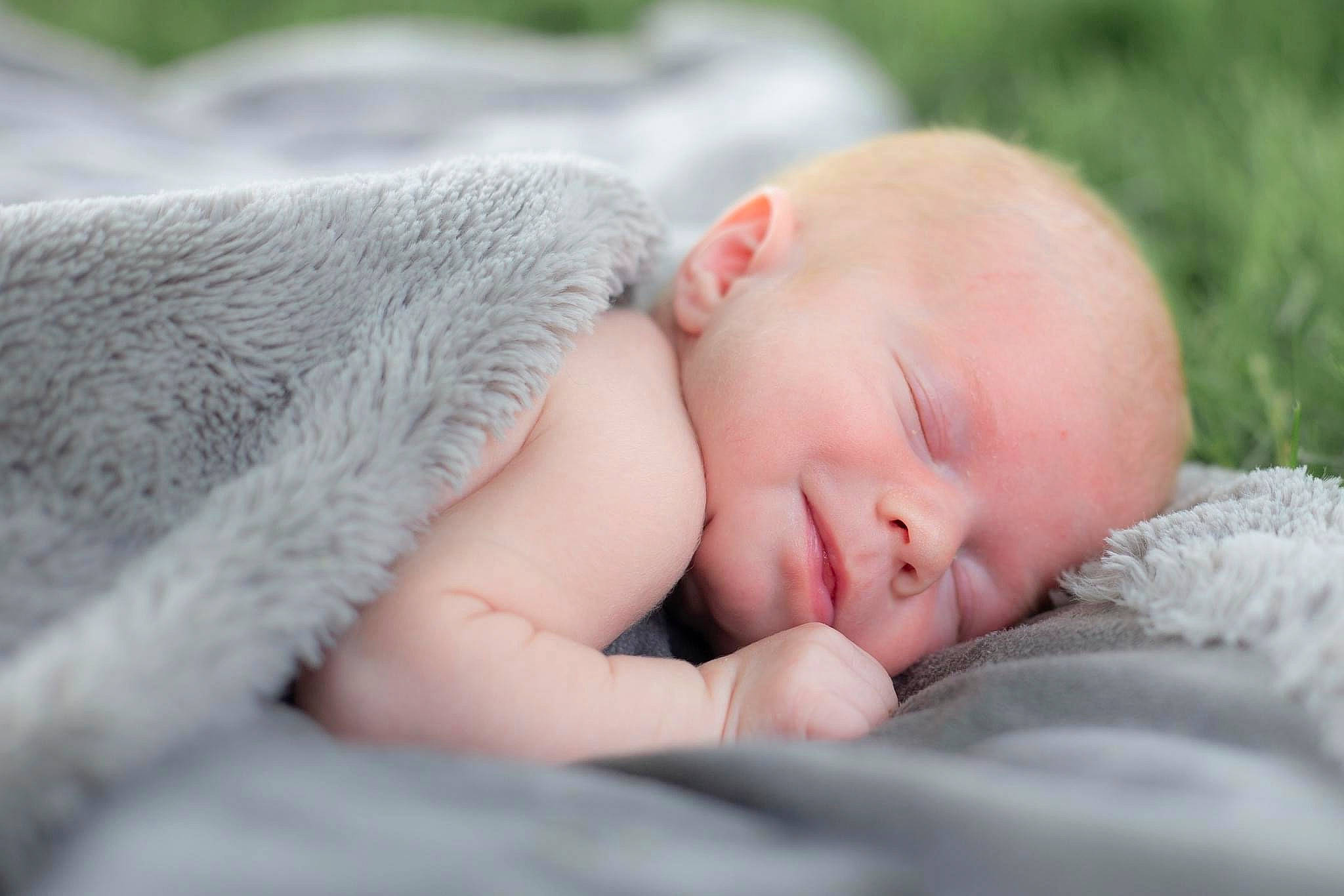 Kayson joined the competition — help win amazing prizes! baby, baby_toddler_clothing, cheek, child, close_up, comfort, event, facial_expression, finger, gesture, grass, happy, hat, iris, mammal, person, portrait_photography, skin, sleep, toddler