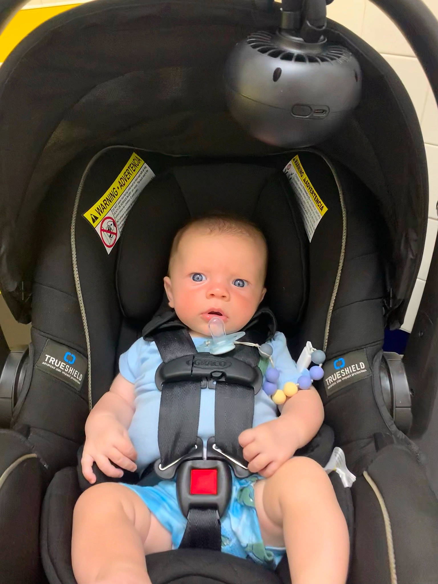 Evan is registered to the contest to win money with this photo: auto_part, automotive_design, baby, baby_carriage, baby_products, car_seat, car_seat_cover, child, comfort, electric_blue, family_car, fun, head_restraint, lap, motor_vehicle, person, seat_belt, service, sitting, toddler