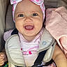 Shaddaimarie is registered to the contest to win money with this photo: baby, child, smiling, headband, bow, car_seat, seatbelt, pink, clothing, cute, happy, infant, toddler, person, portrait, sitting, indoors, skin, face, eyes