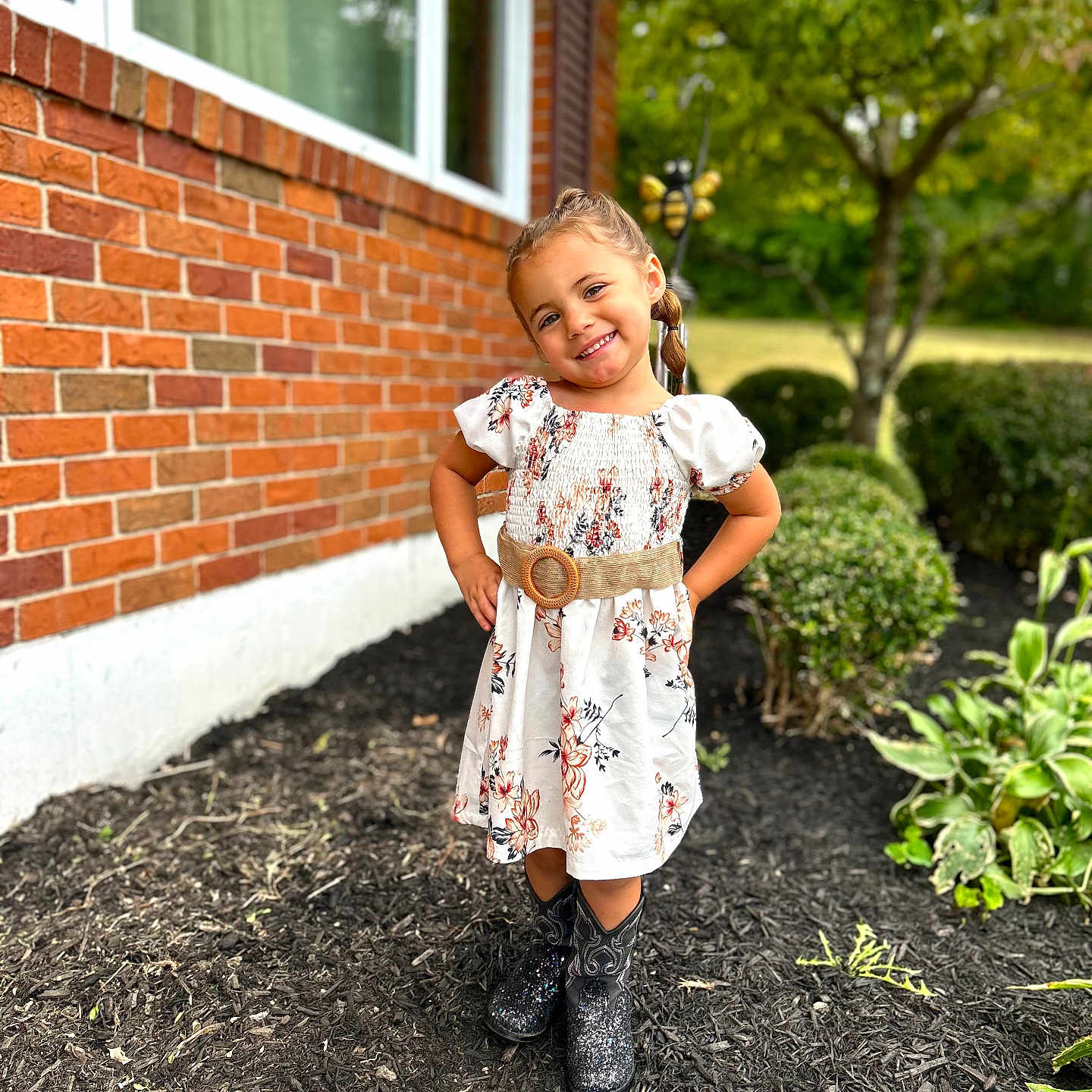 Jordlynn is registered to the contest to win money with this photo: backyard, child, clothing, dress, face, female, girl, happy, head, nature, outdoors, pants, person, photography, portrait, sitting, sleeve, smile, standing, yard