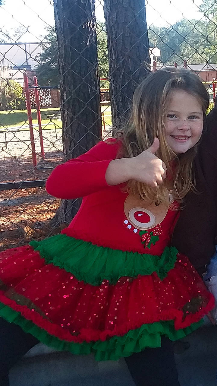 Shelbi joined the competition — help win amazing prizes! child, clothing, costume, design, dress, fawn, fictional_character, fun, green, joy, pattern, person, polka_dot, red, smile, toddler, tree