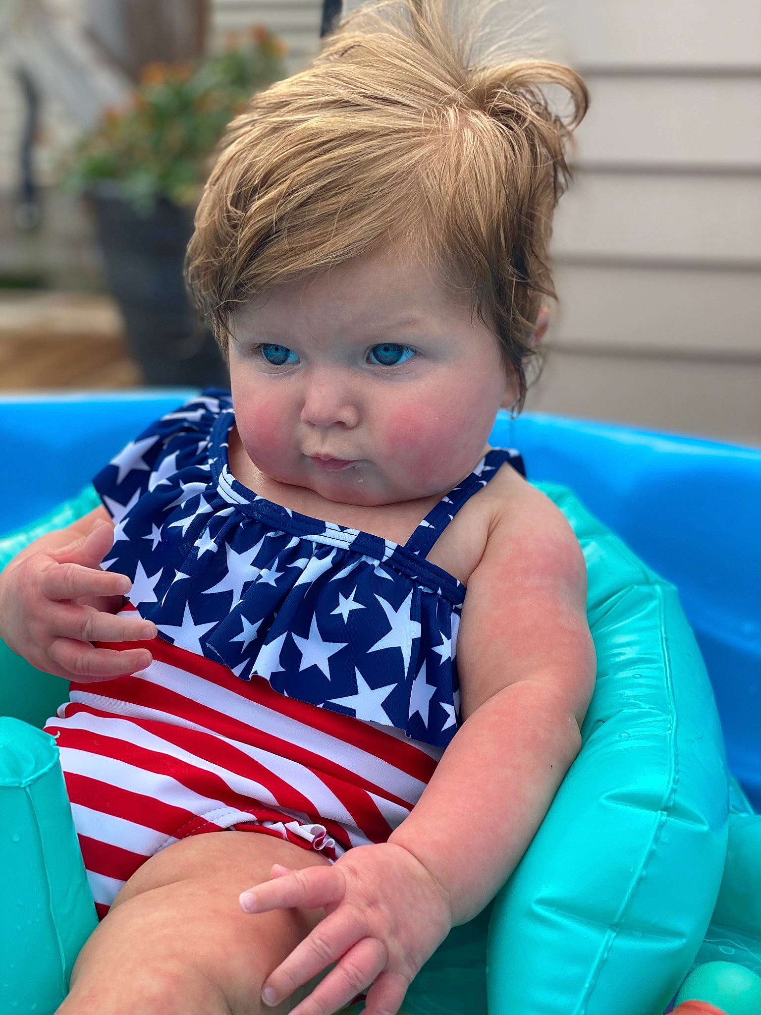 Mabel is registered to the contest to win money with this photo: azure, baby_toddler_clothing, beauty, blue, child, dress, electric_blue, fun, grass, hair, hairstyle, hand, happy, houseplant, iris, leisure, person, recreation, skin, toddler