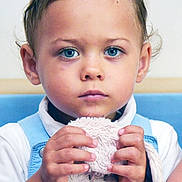 Maylo participe au concours pour gagner de l'argent avec cette photo : blue_eyes, blue_overalls, child, clothing, cute, expression, face, hair, hands, indoor, innocence, looking_at_camera, plush_toy, portrait, soft_lighting, stuffed_animal, toddler, toy, white_shirt, young