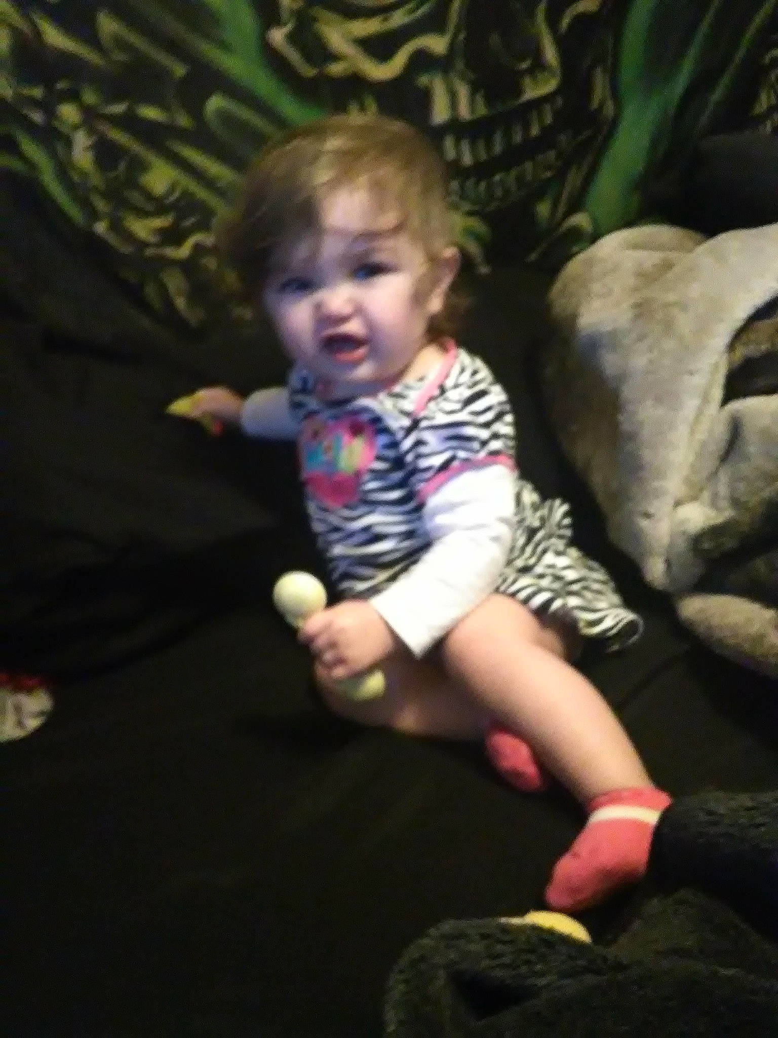 Huntley is registered to the contest to win money with this photo: arm, baby, cheek, child, fun, leg, person, play, sitting, skin, toddler