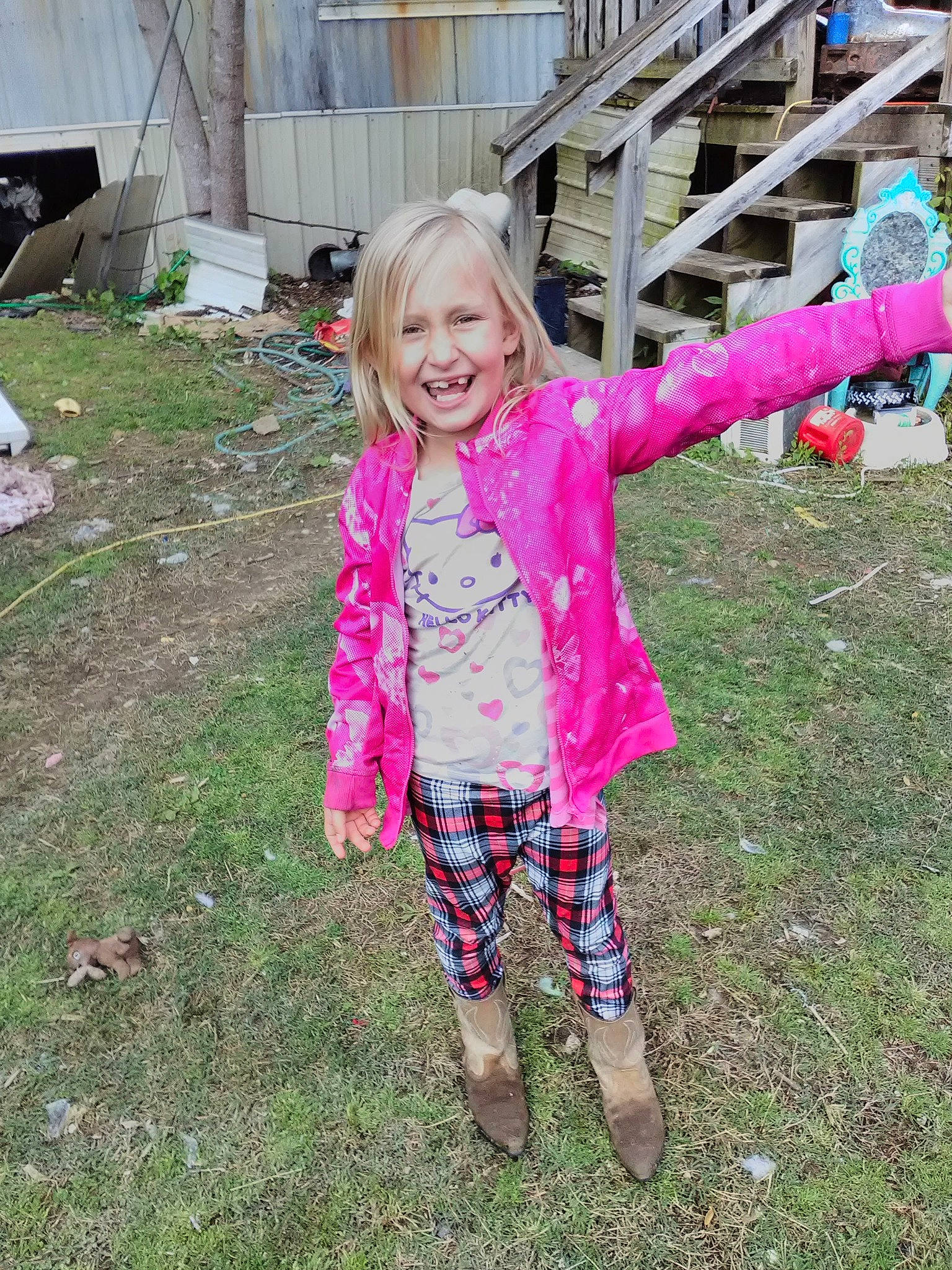Jasmine is registered to the contest to win money with this photo: child, fun, grass, joy, leggings, magenta, outerwear, pattern, person, pink, plant, play, sleeve, smile