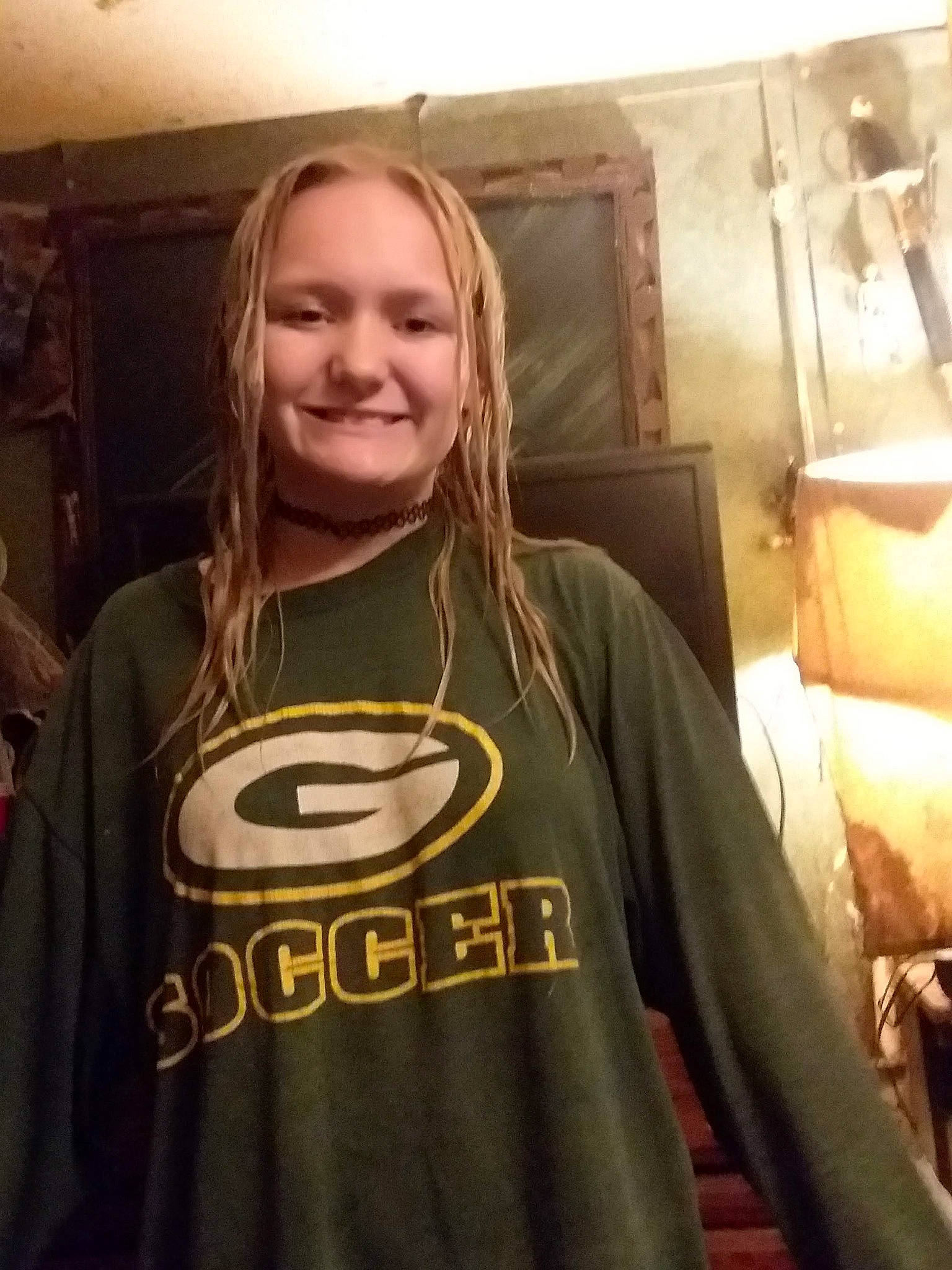 Chloe Carter is registered to the contest to win money with this photo: cool, fictional_character, joy, long_hair, mouth, outerwear, person, selfie, sleeve, smile, t_shirt, top